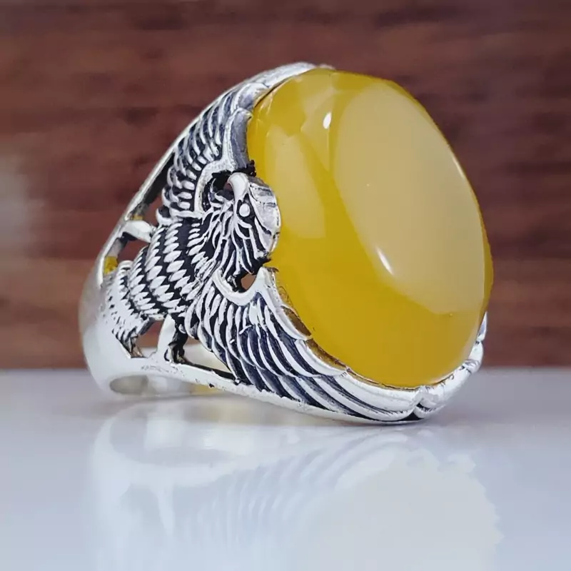 انگشتر مردانه عقیق زرد شرف شمس طرح عقاب (کد 1115)